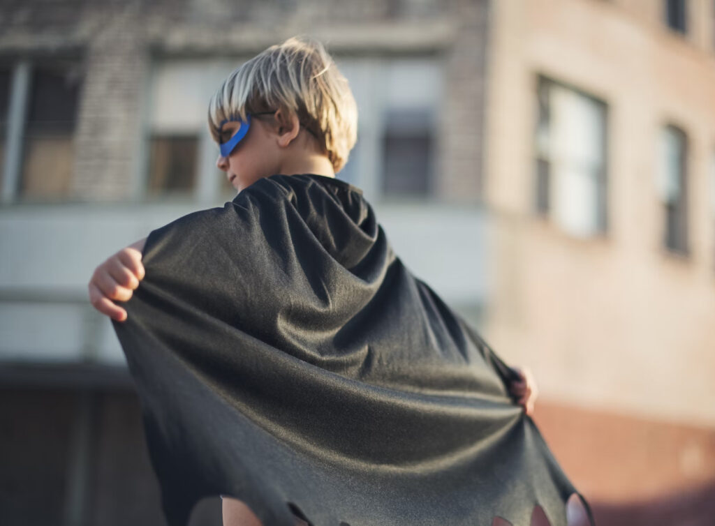 A child portraying a superhero.